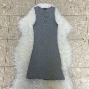 Don’t ask why grey stretchy fitted dress fits like a small but says one size